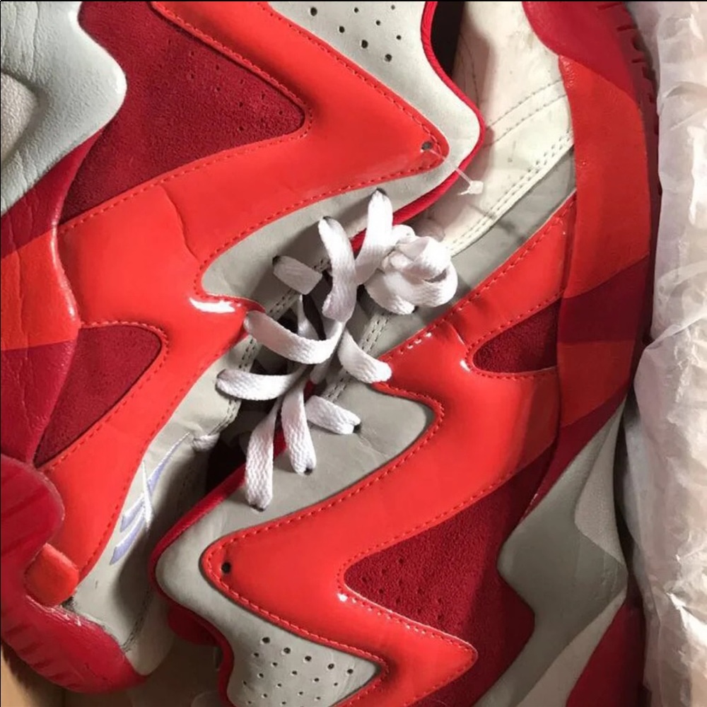 Men’s red white Reebok sneaker